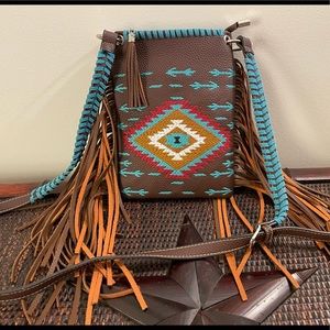 Super cute!!  Fringe Cross body bag!